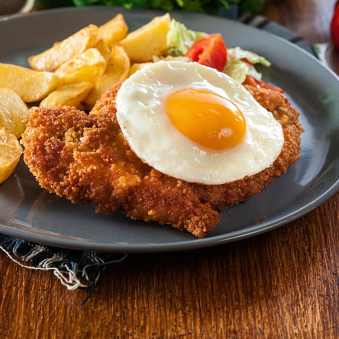 Milanesa al plato, a Caballo